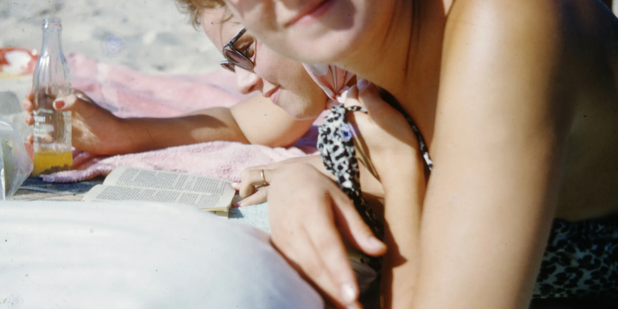 woman in black and white polka dot bikini top wearing sunglasses