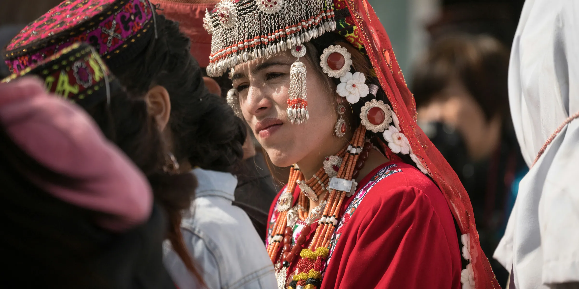 group of people with headdresses
