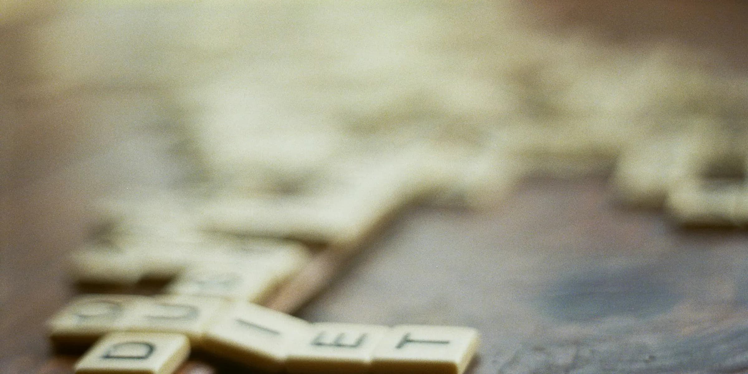 shallow focus photography of scrabble pieces