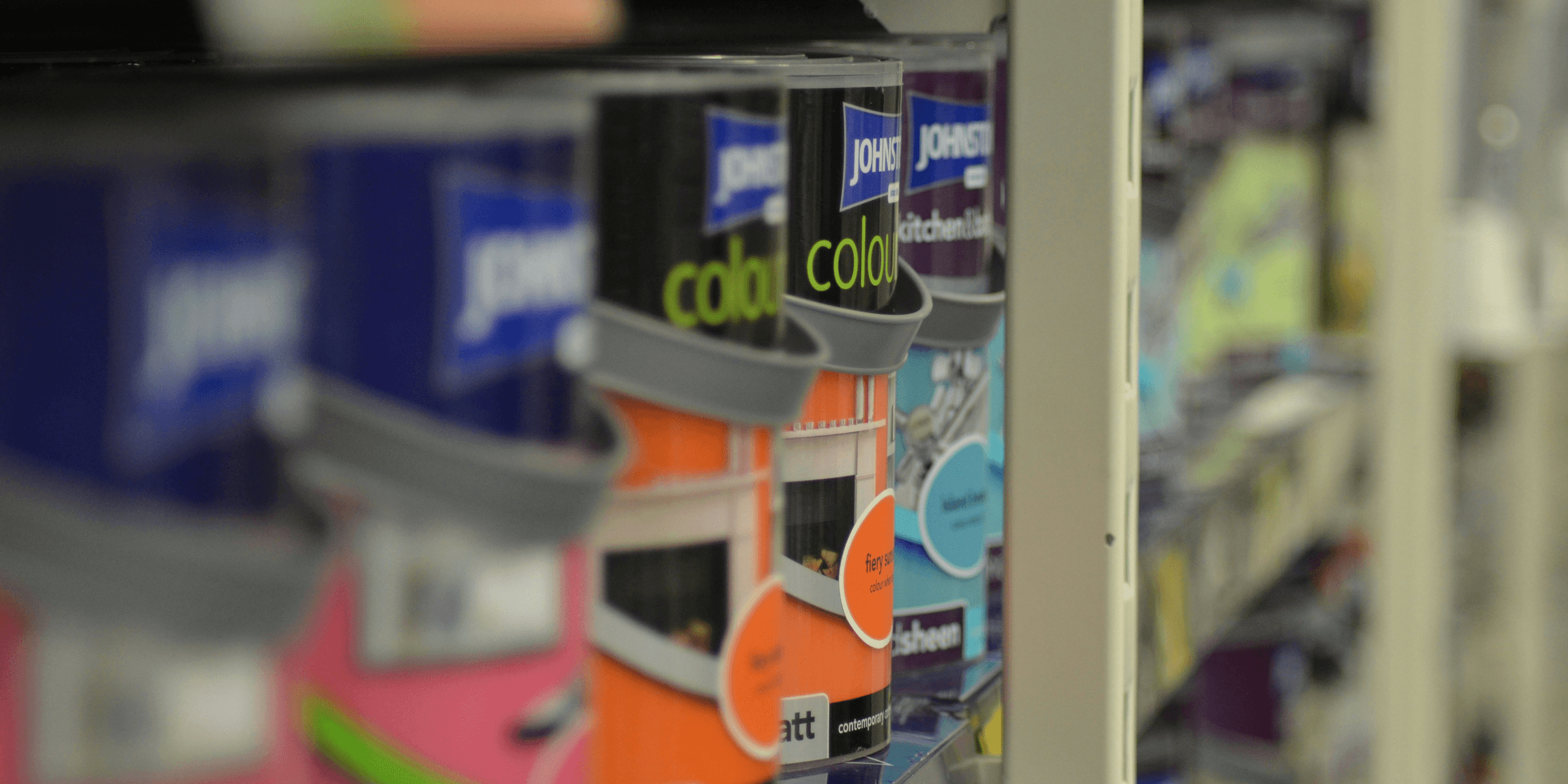 assorted-color paint tin cans