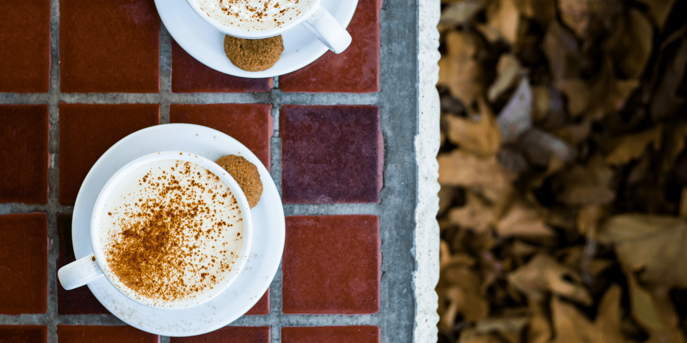 two cup of coffee on table top