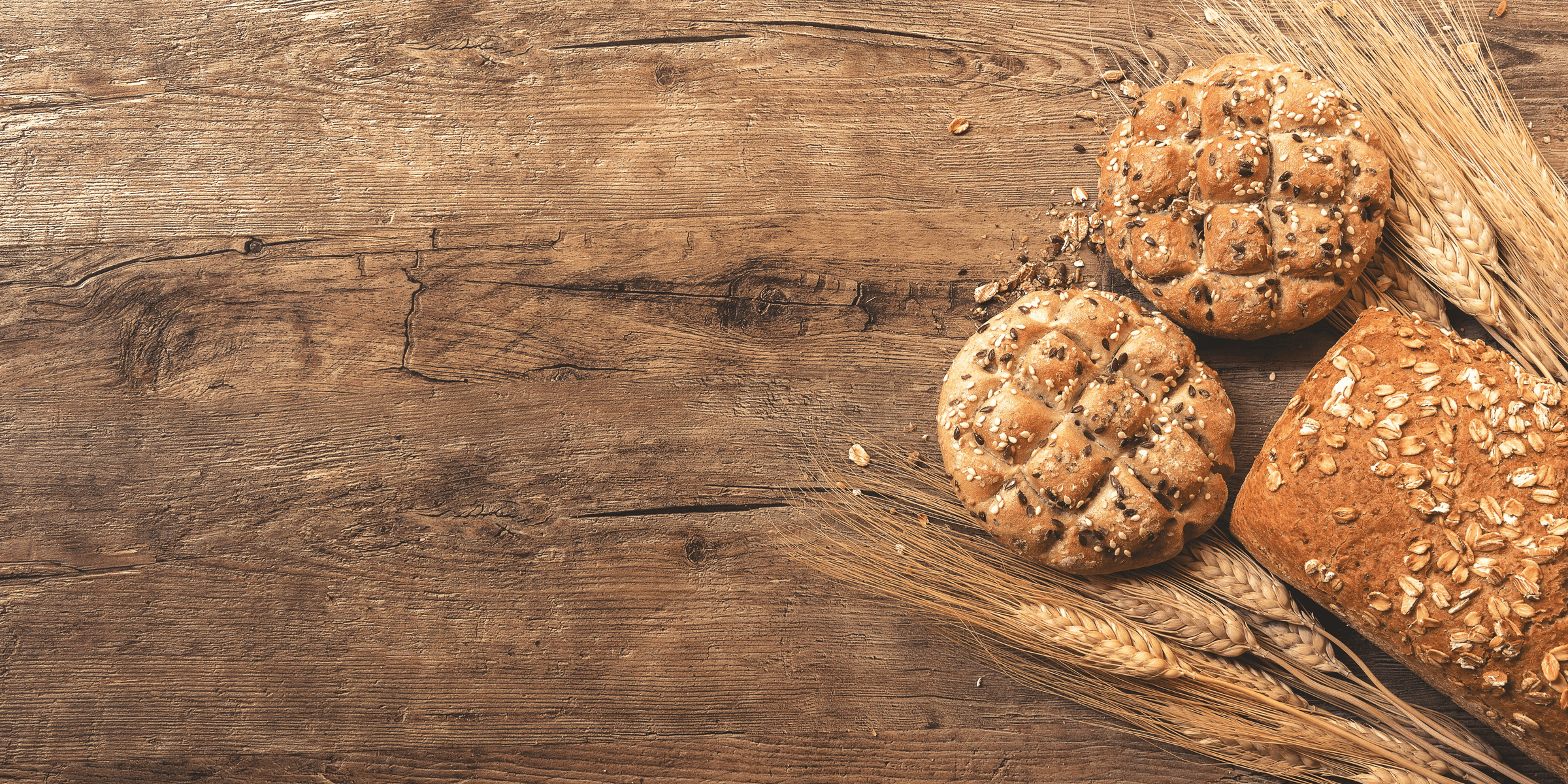 cookies, bread, and wheat on table