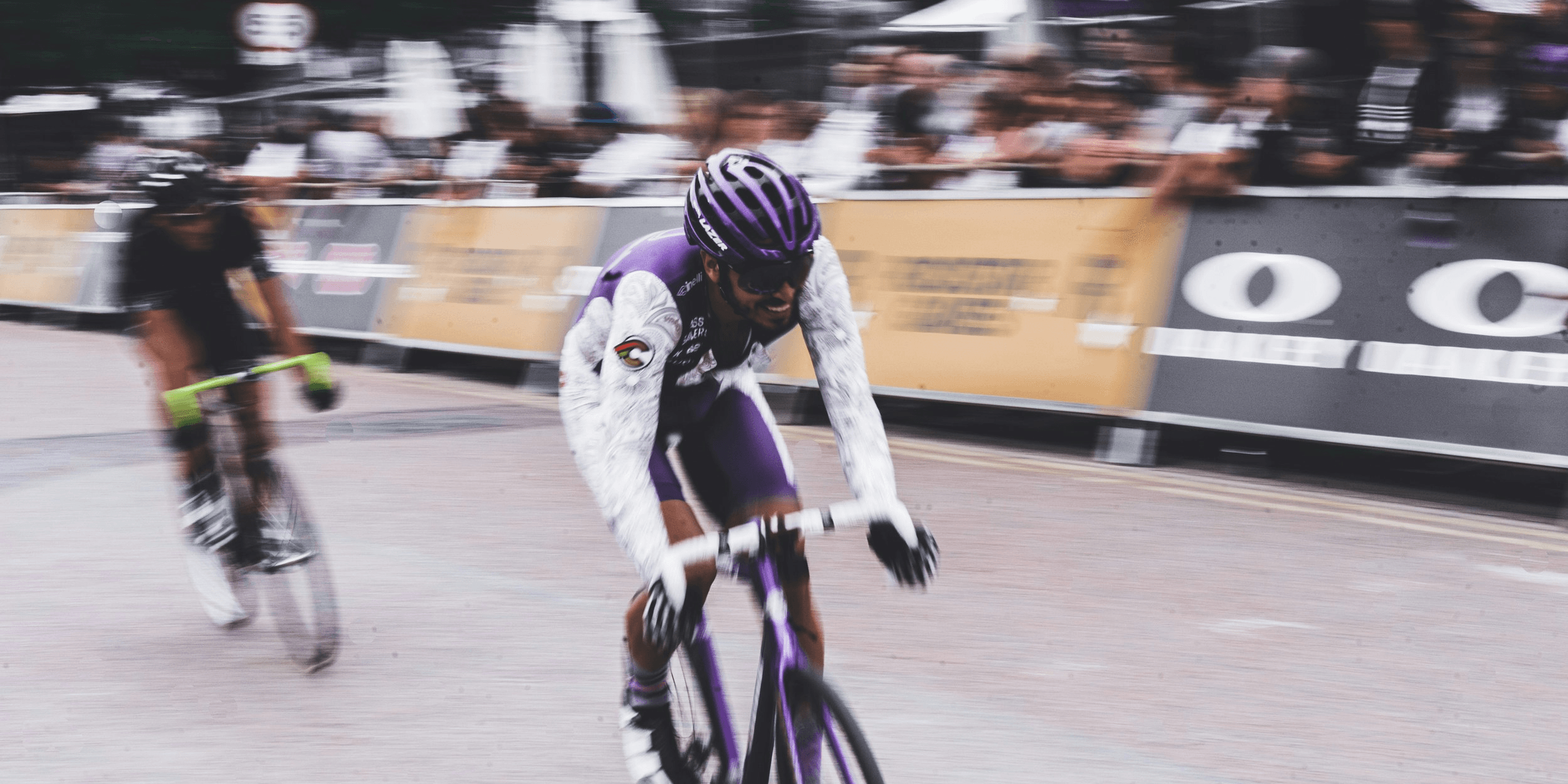 two men bike racing during daytime