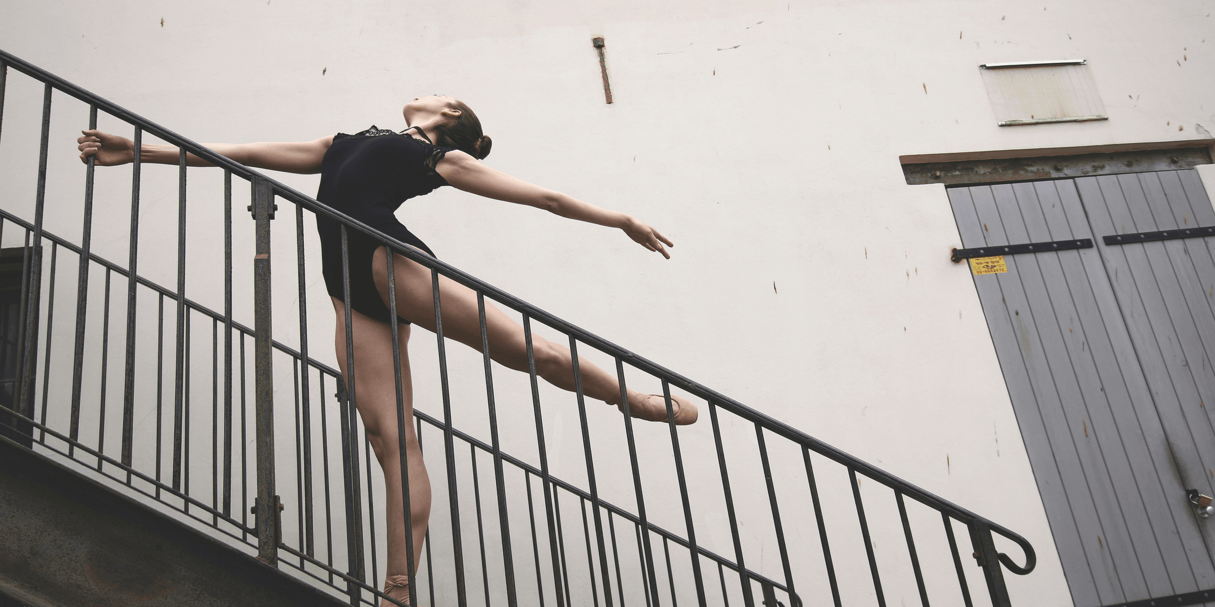 ballerina dancer on staircase.