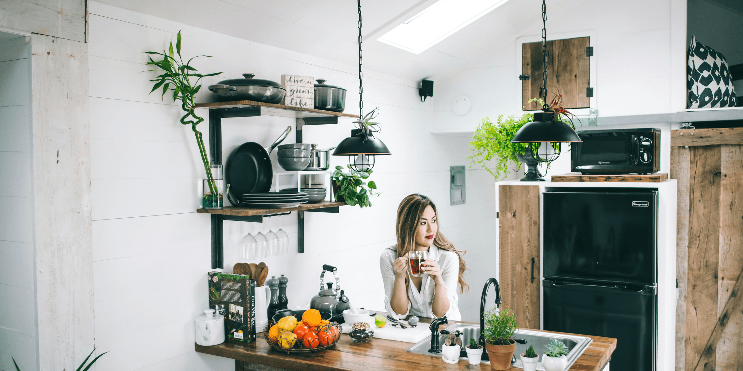 woman sitting in front of table.