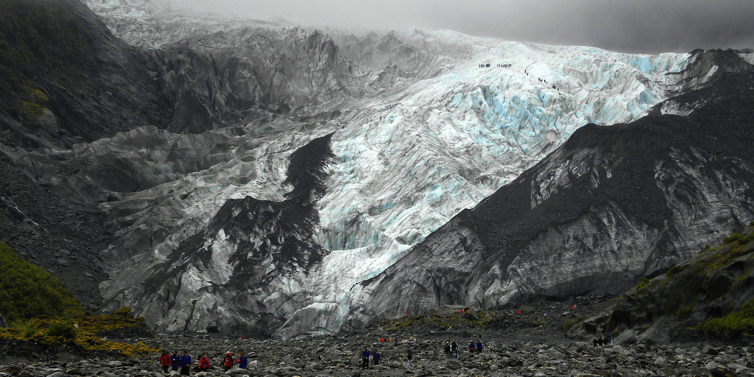 people walking near mountain