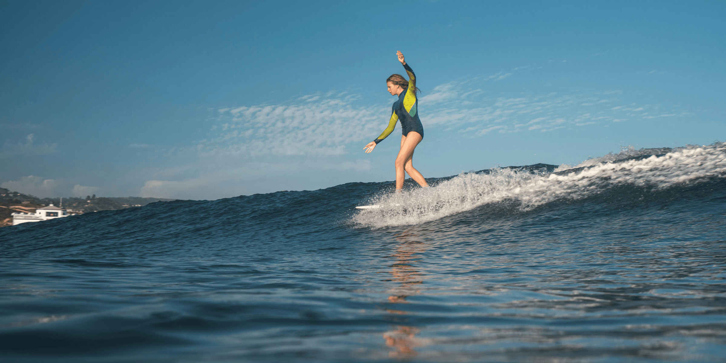 woman surfing.