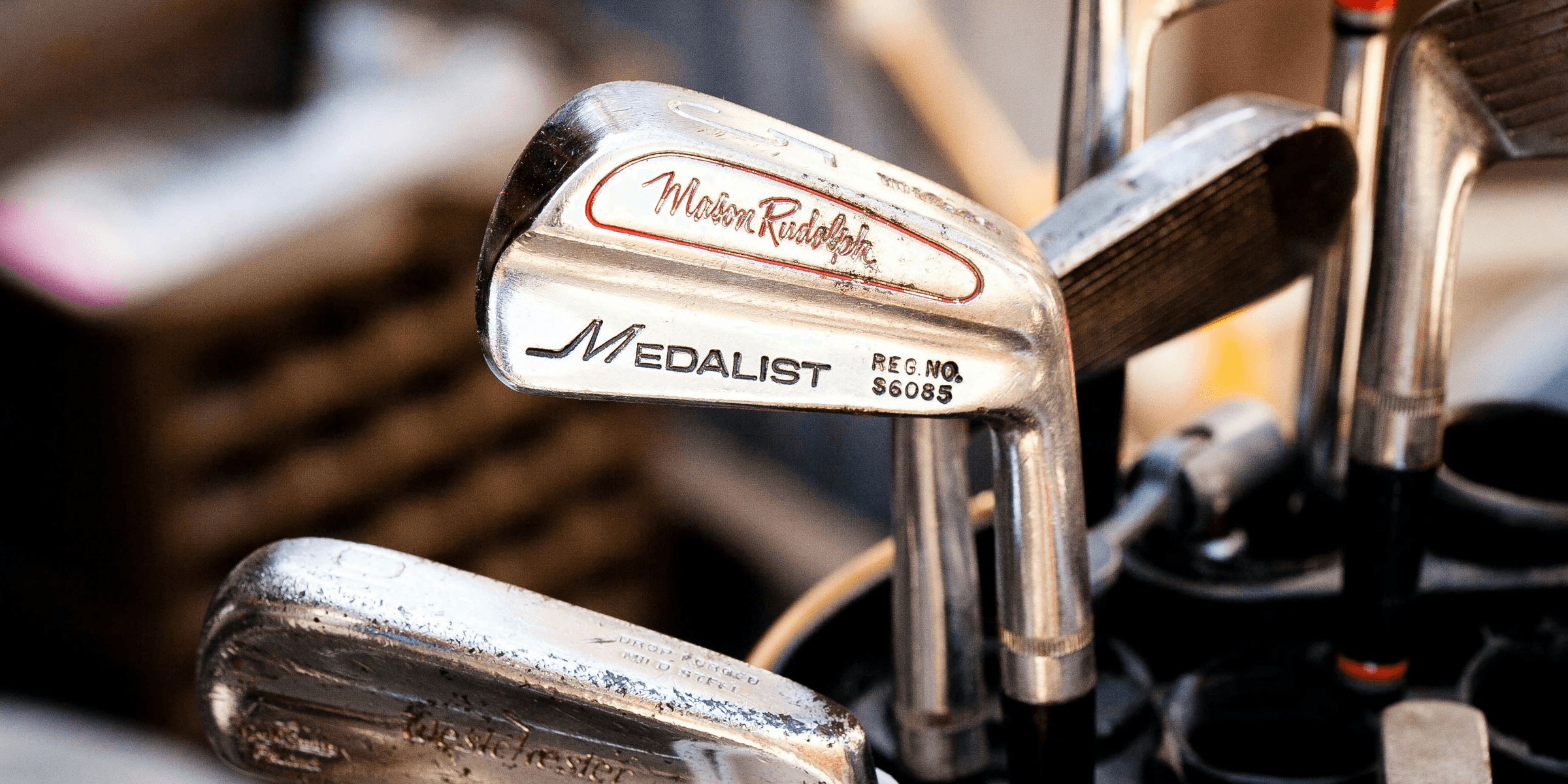 gray Medalist golf clubs.