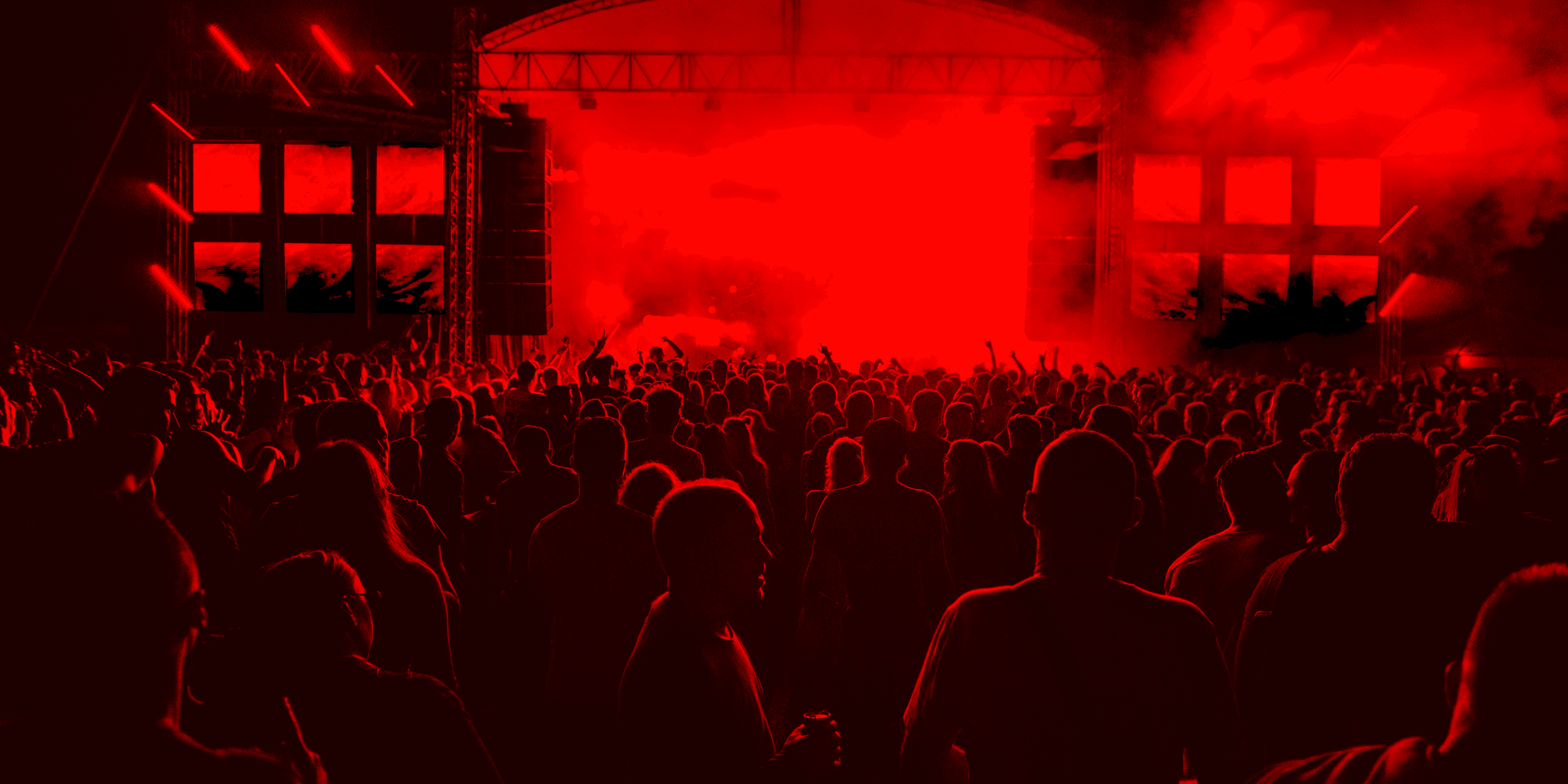 people inside concert ground at night.