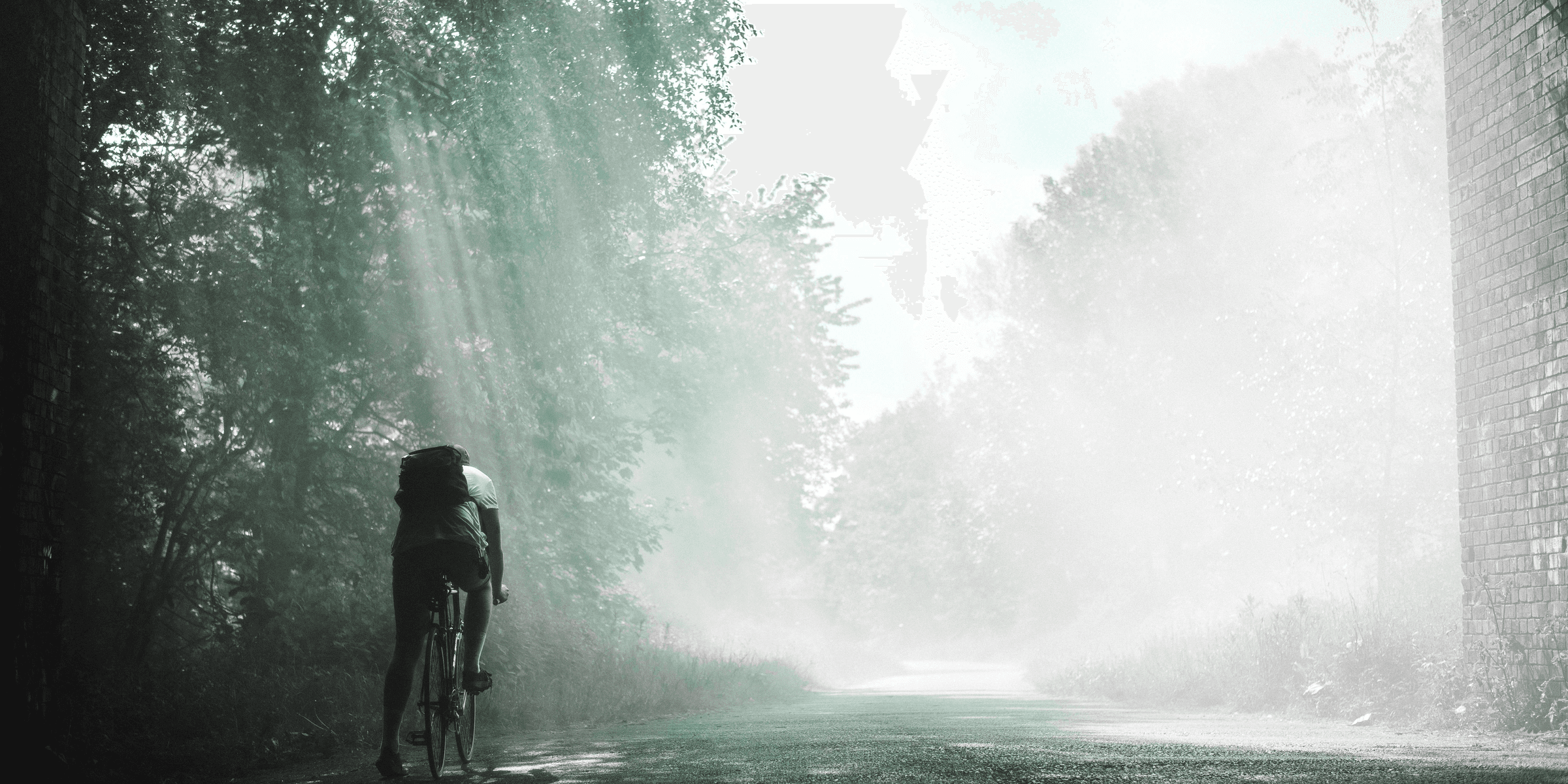 person riding on bicycle during daytime.