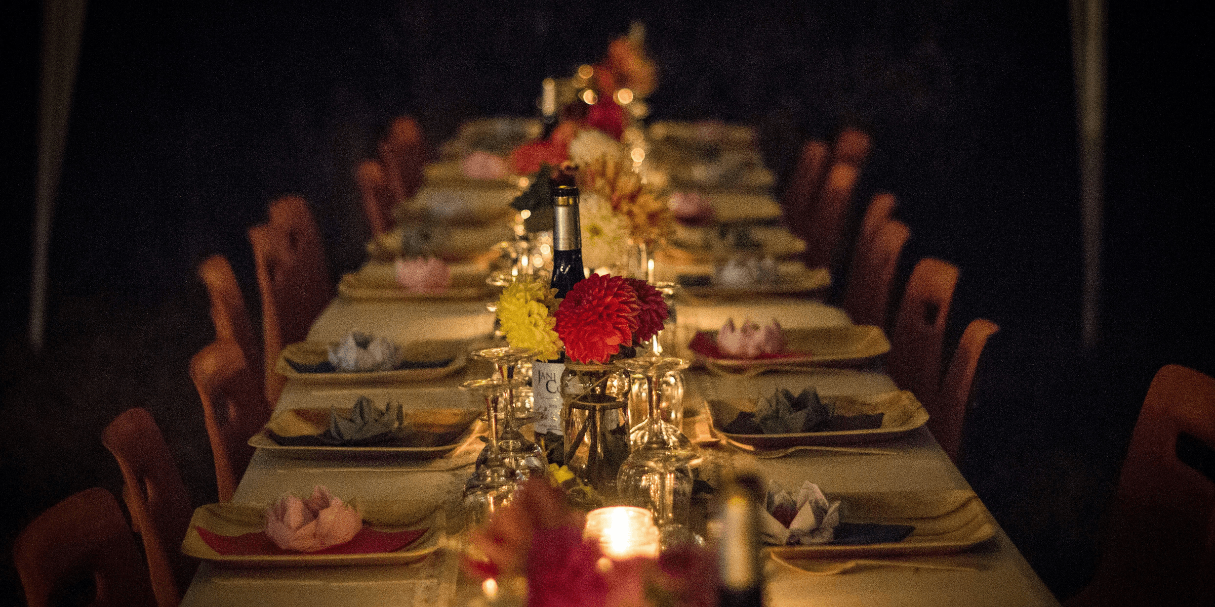 white and green ceramic plates on brown wooden dining table.