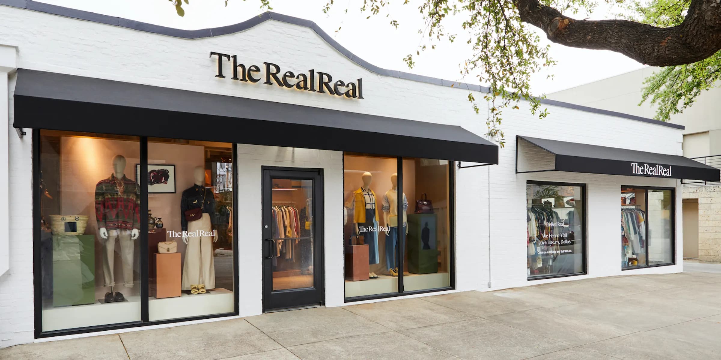 exterior of a building with The RealReal signage