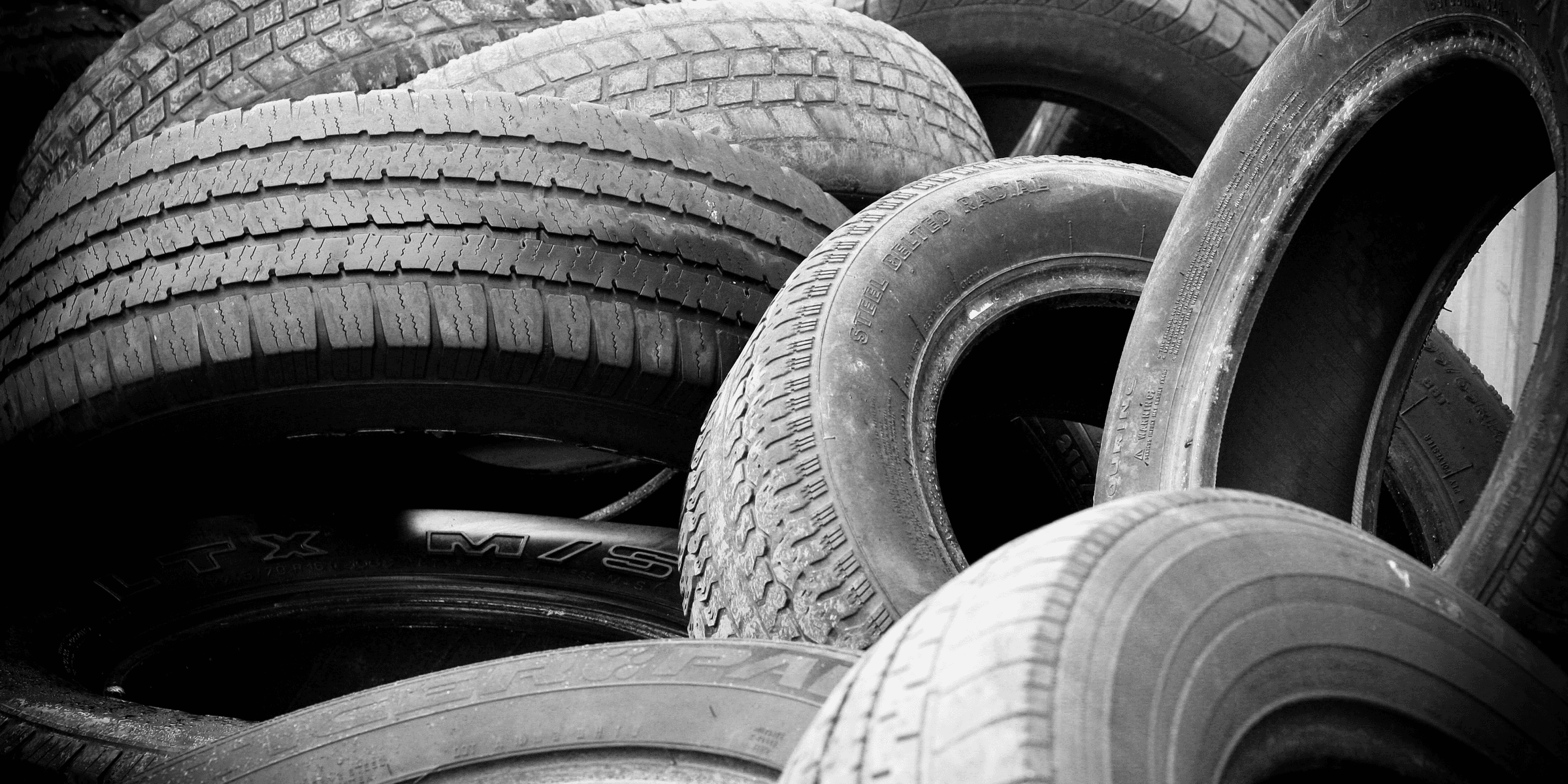 pile of vehicle tire lot.