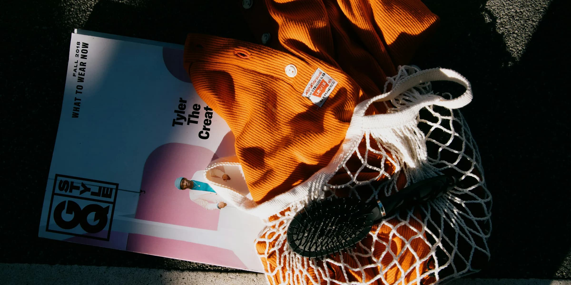 orange and black knit textile