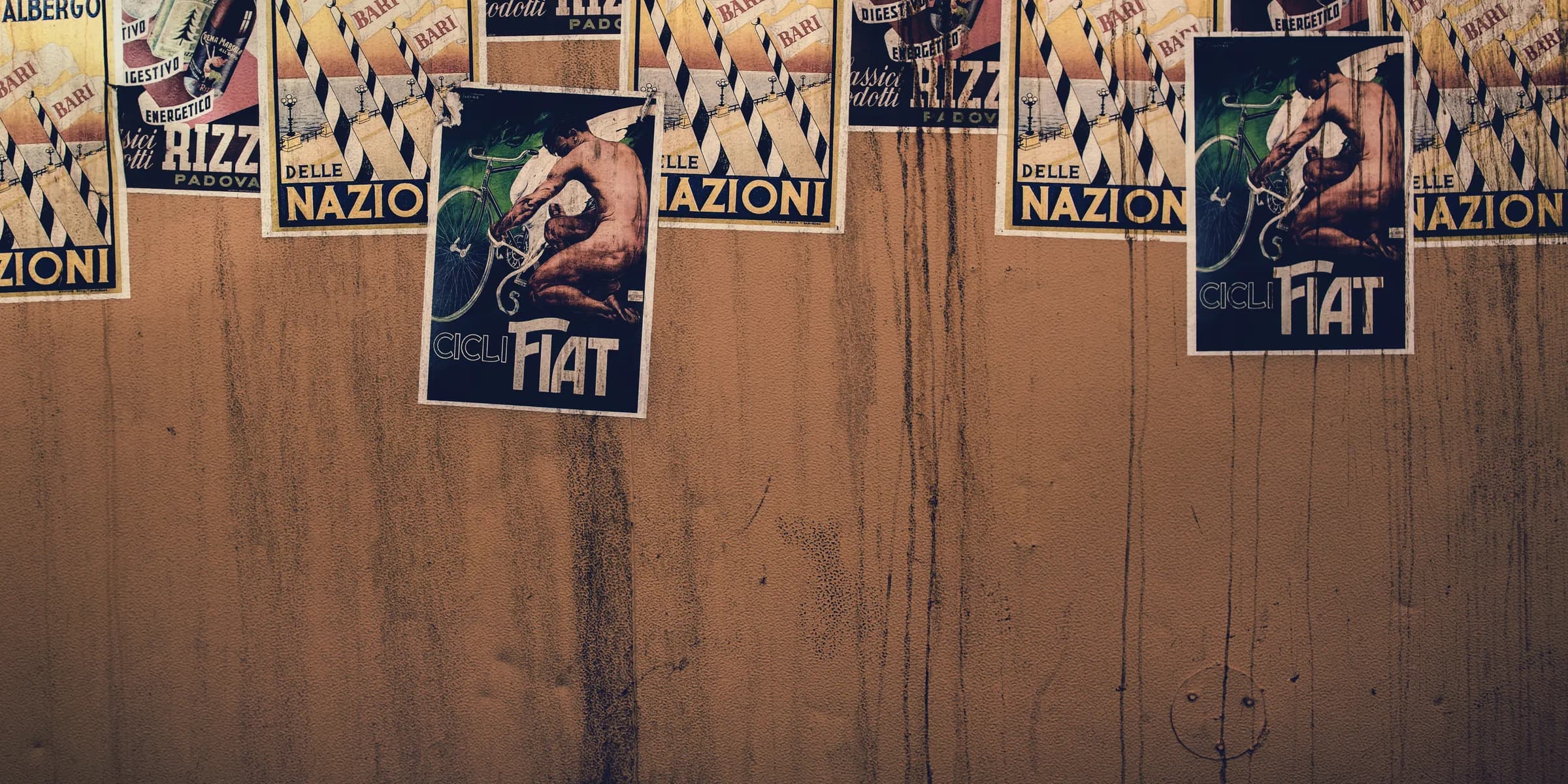 Fiat stickers on wall inside room