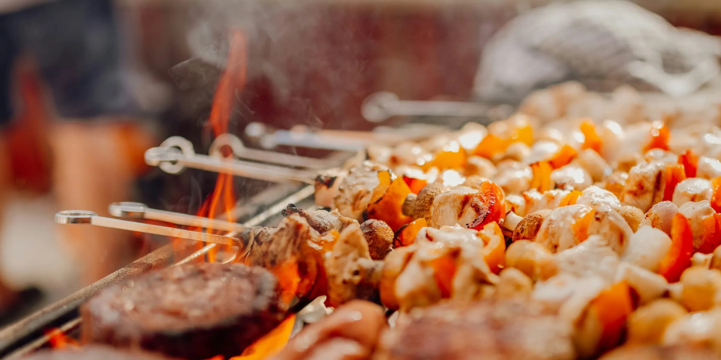 bbq with skewers of chicken roasting
