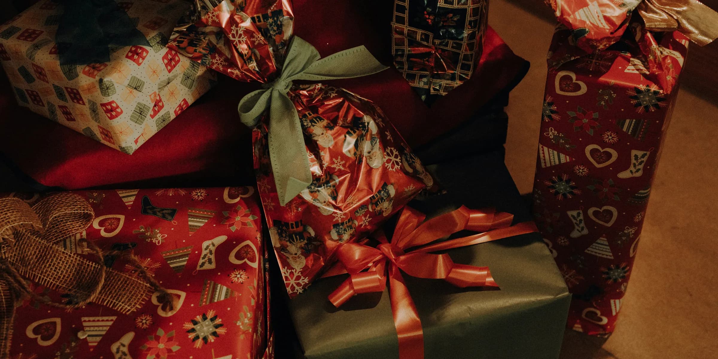 a pile of wrapped presents sitting next to each other
