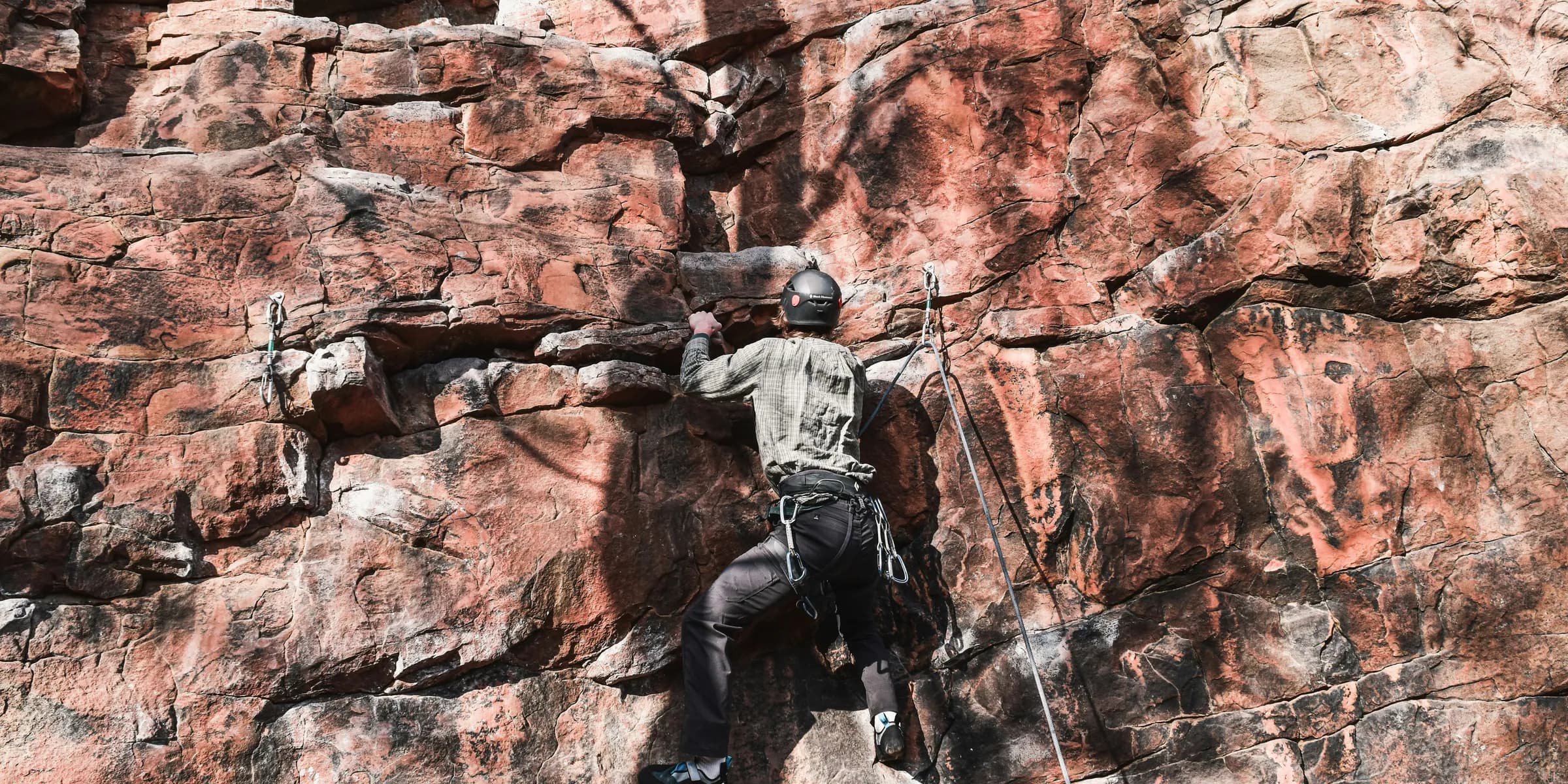man doing rock climbing
