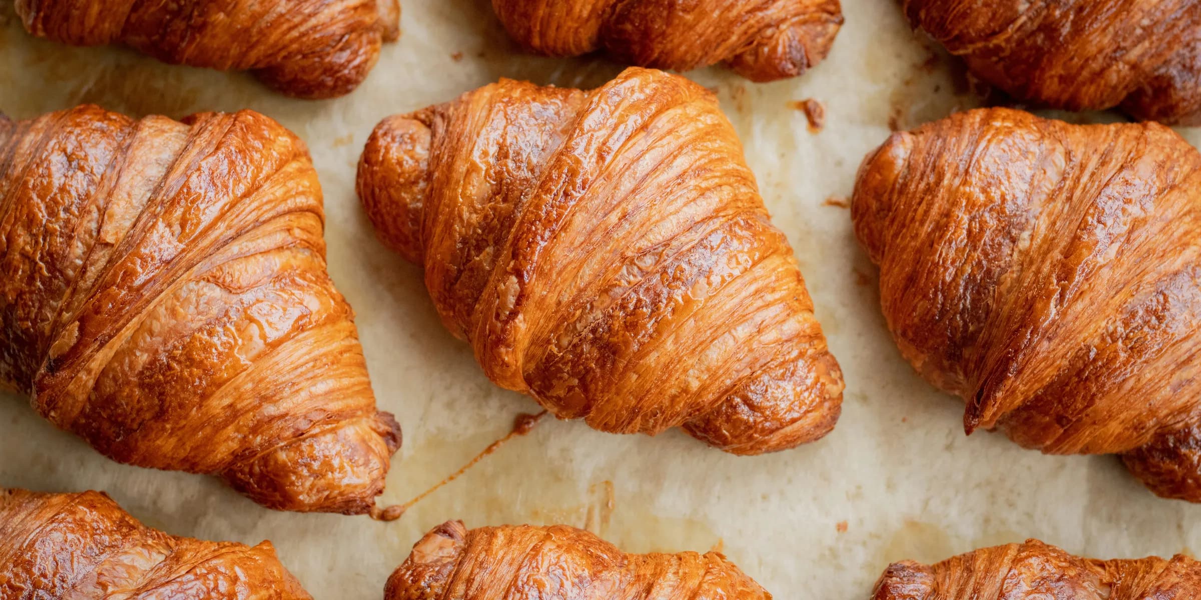 a bunch of croissants that are on a table