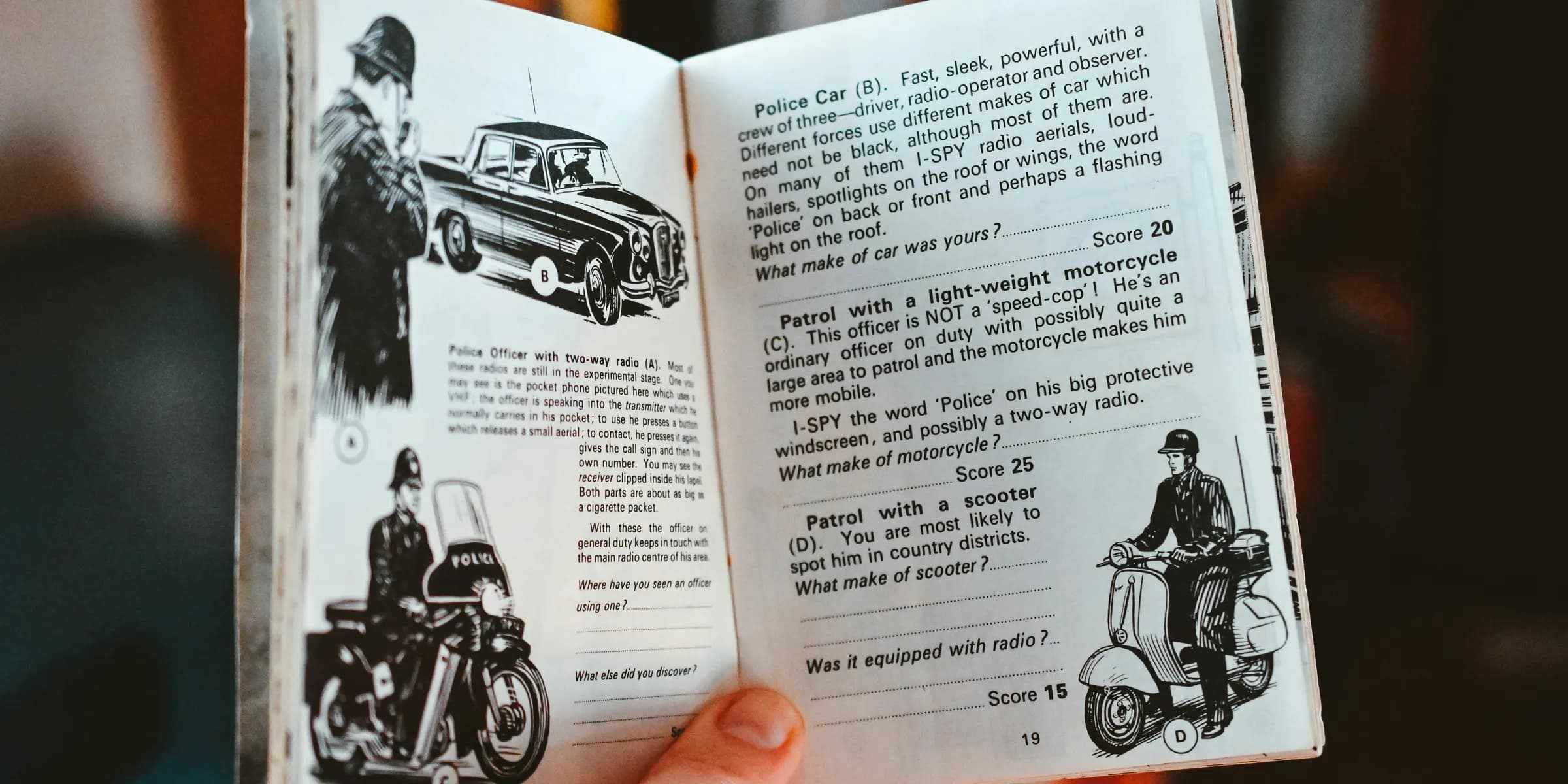 a person holding a book open to a page