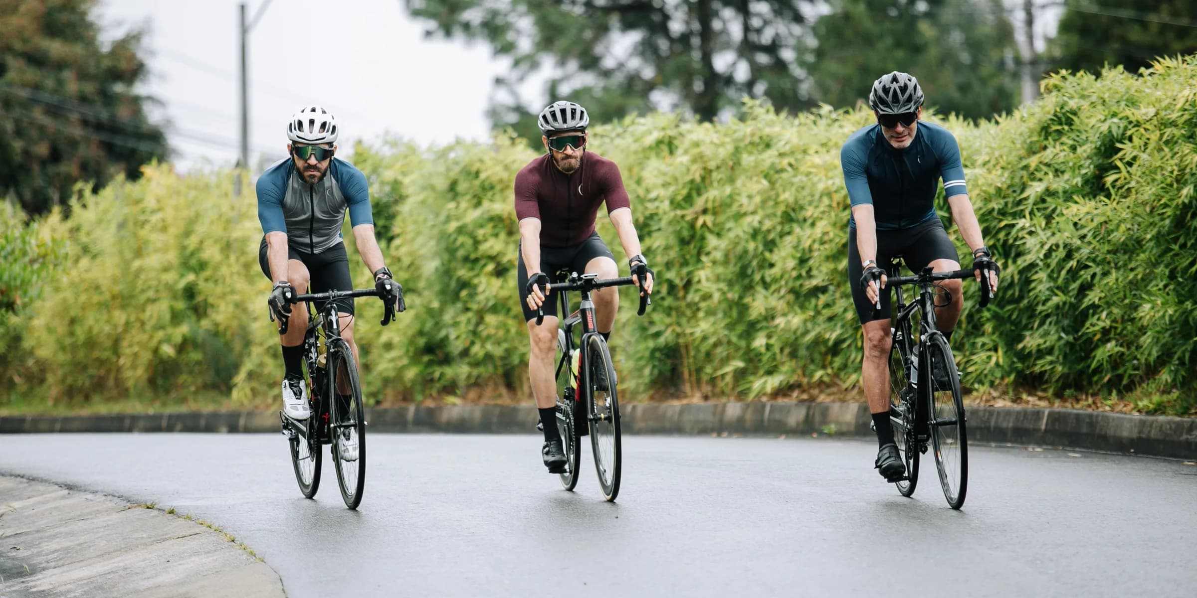 men riding on bicycle on road during daytime