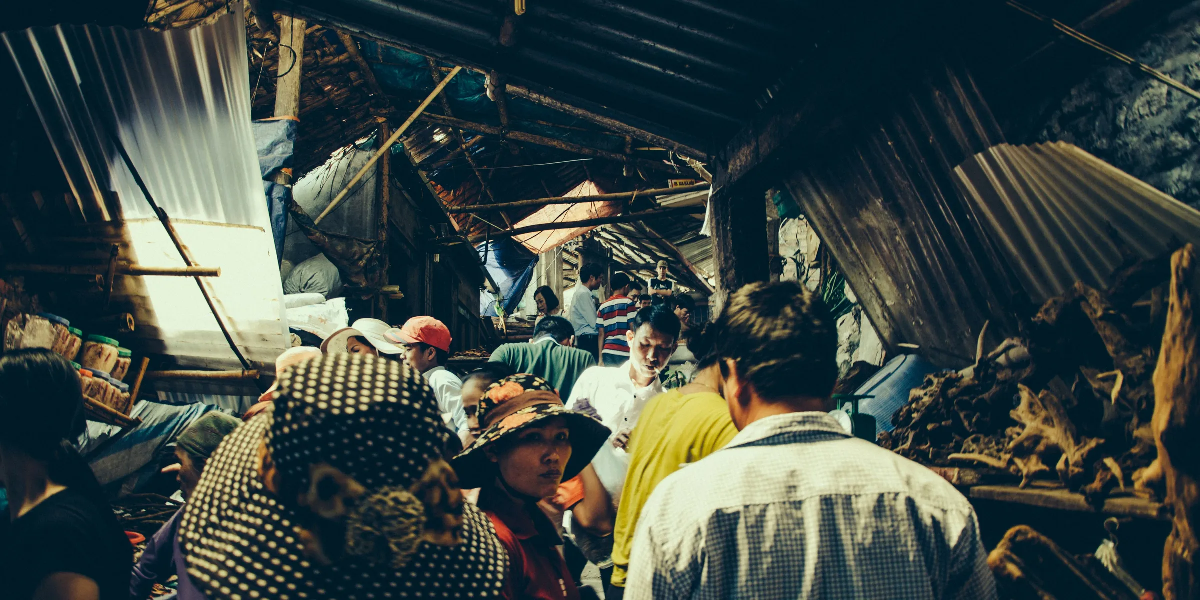 group of people standing inside structure