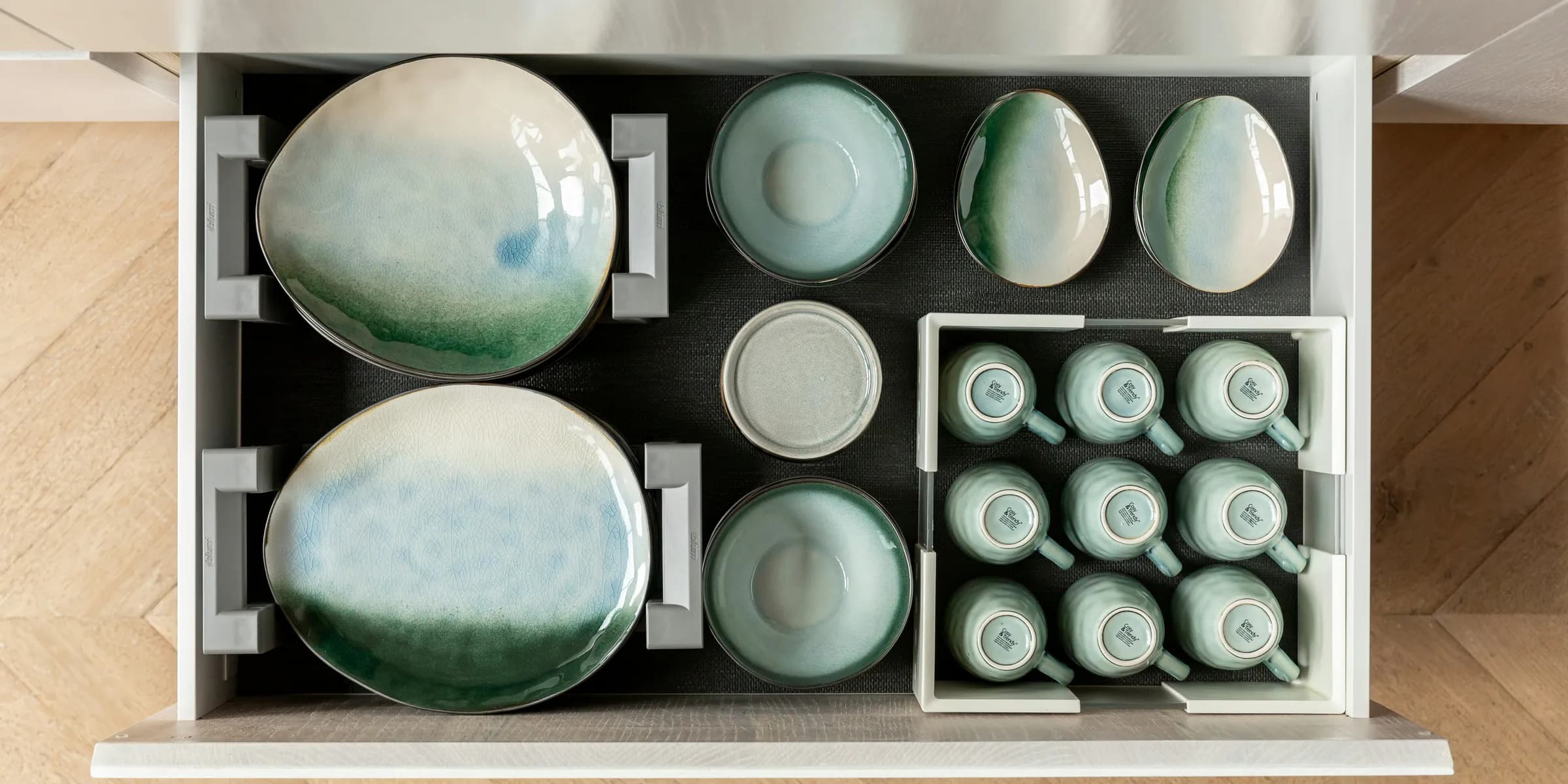 a box with a bunch of dishes inside of it