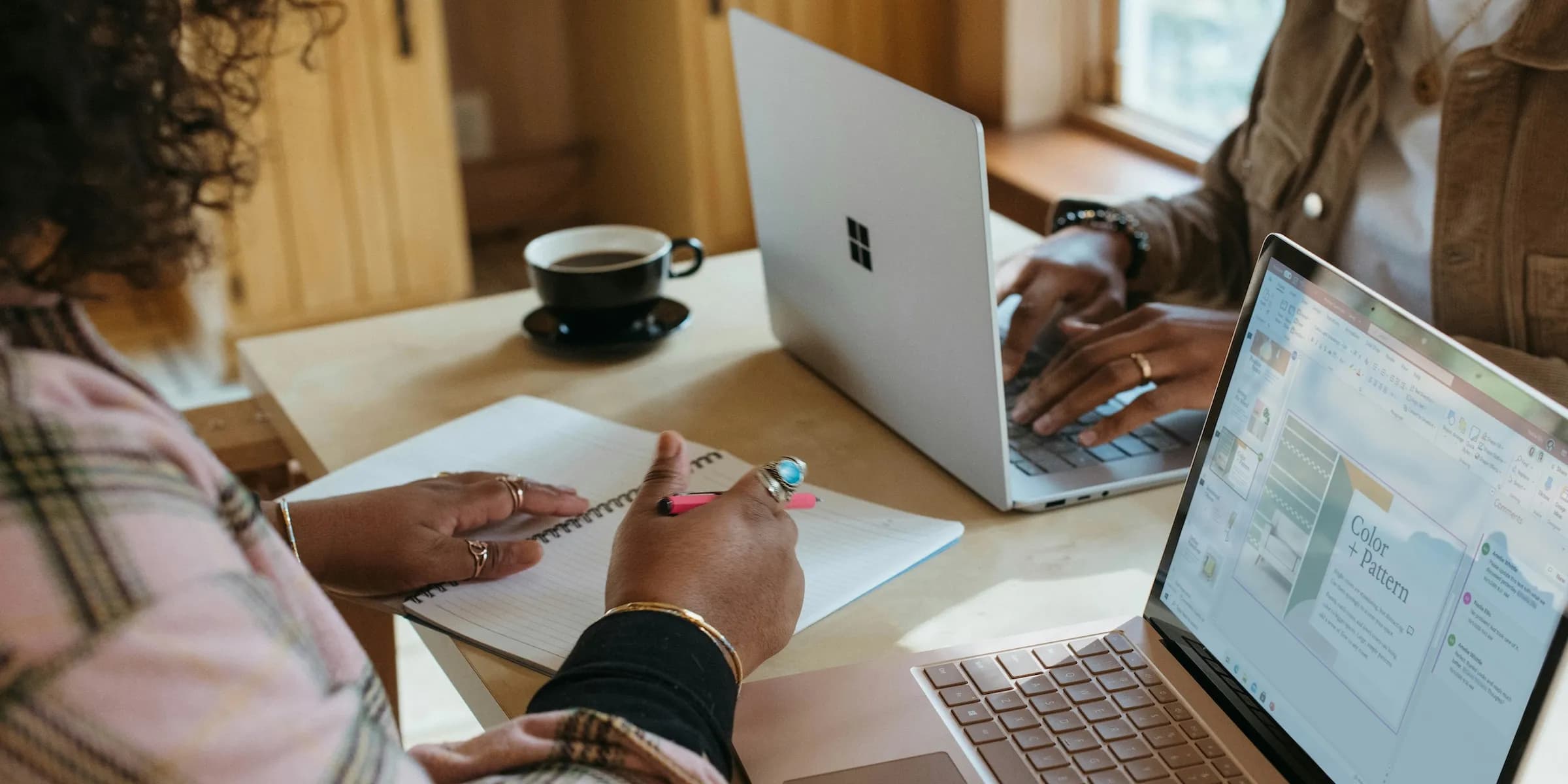 a group of people studying at a cafe