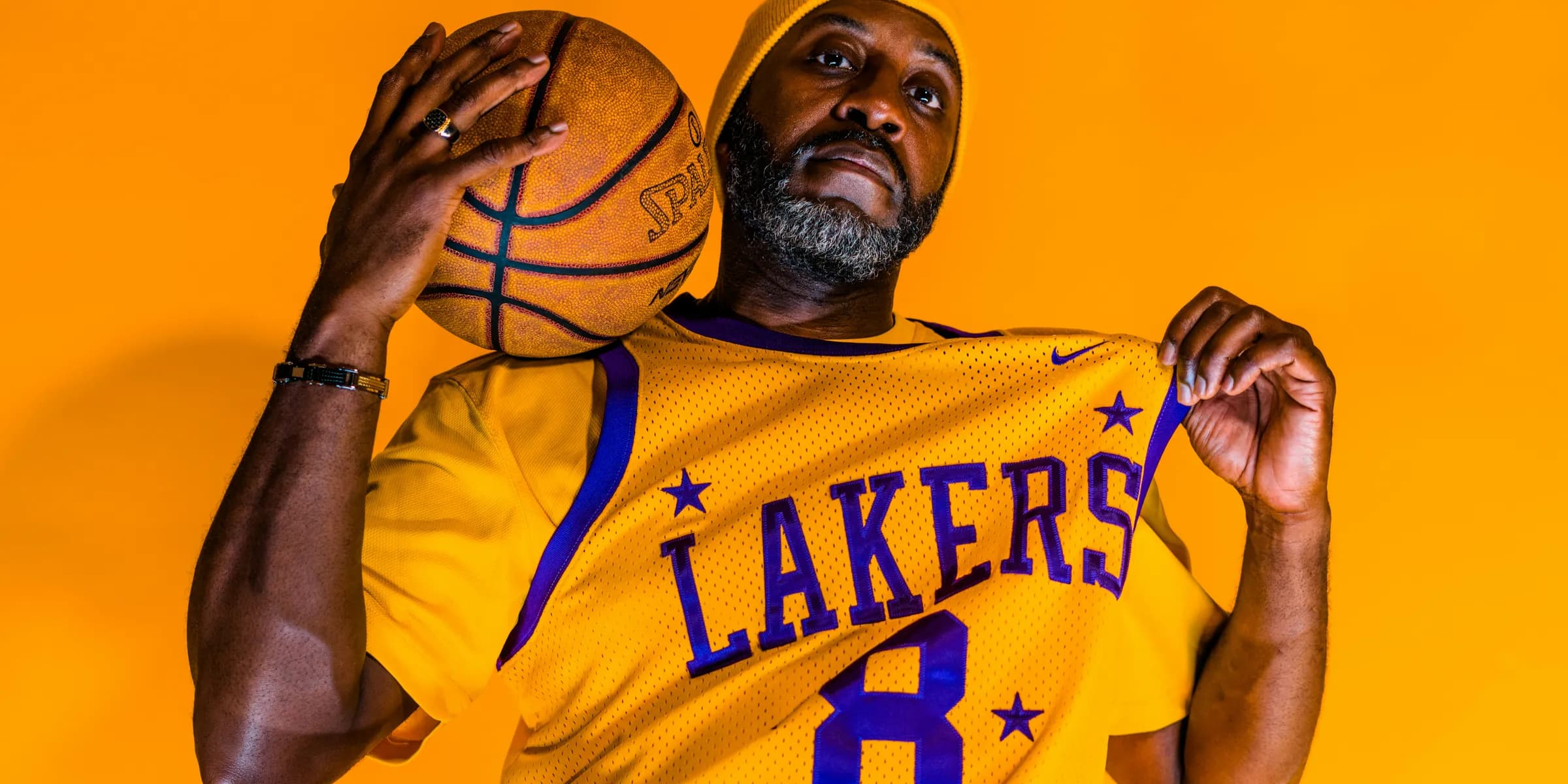 person wearing a Los Angeles Lakers jersey