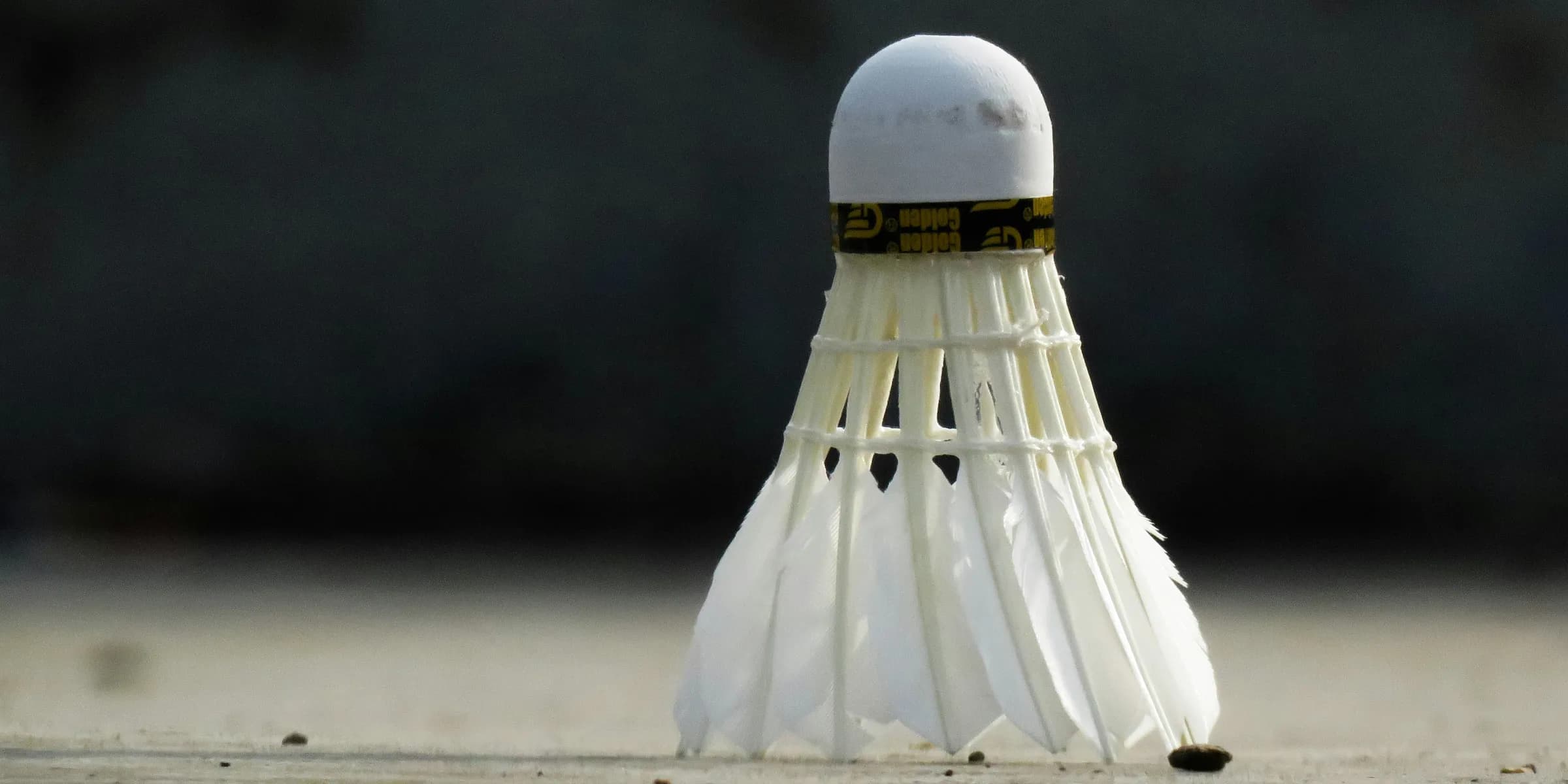 white and gold human figurine