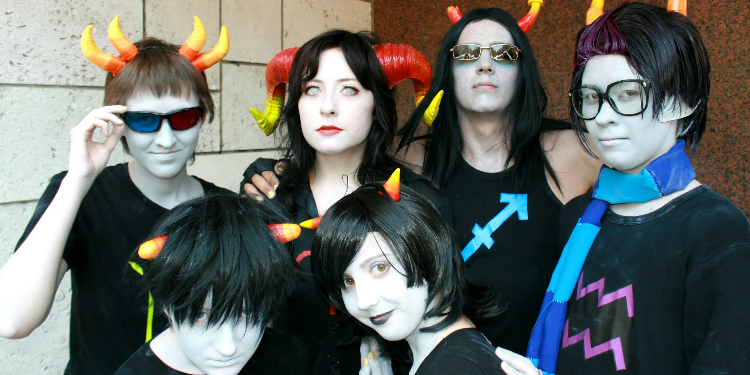 group of people in halloween costumes