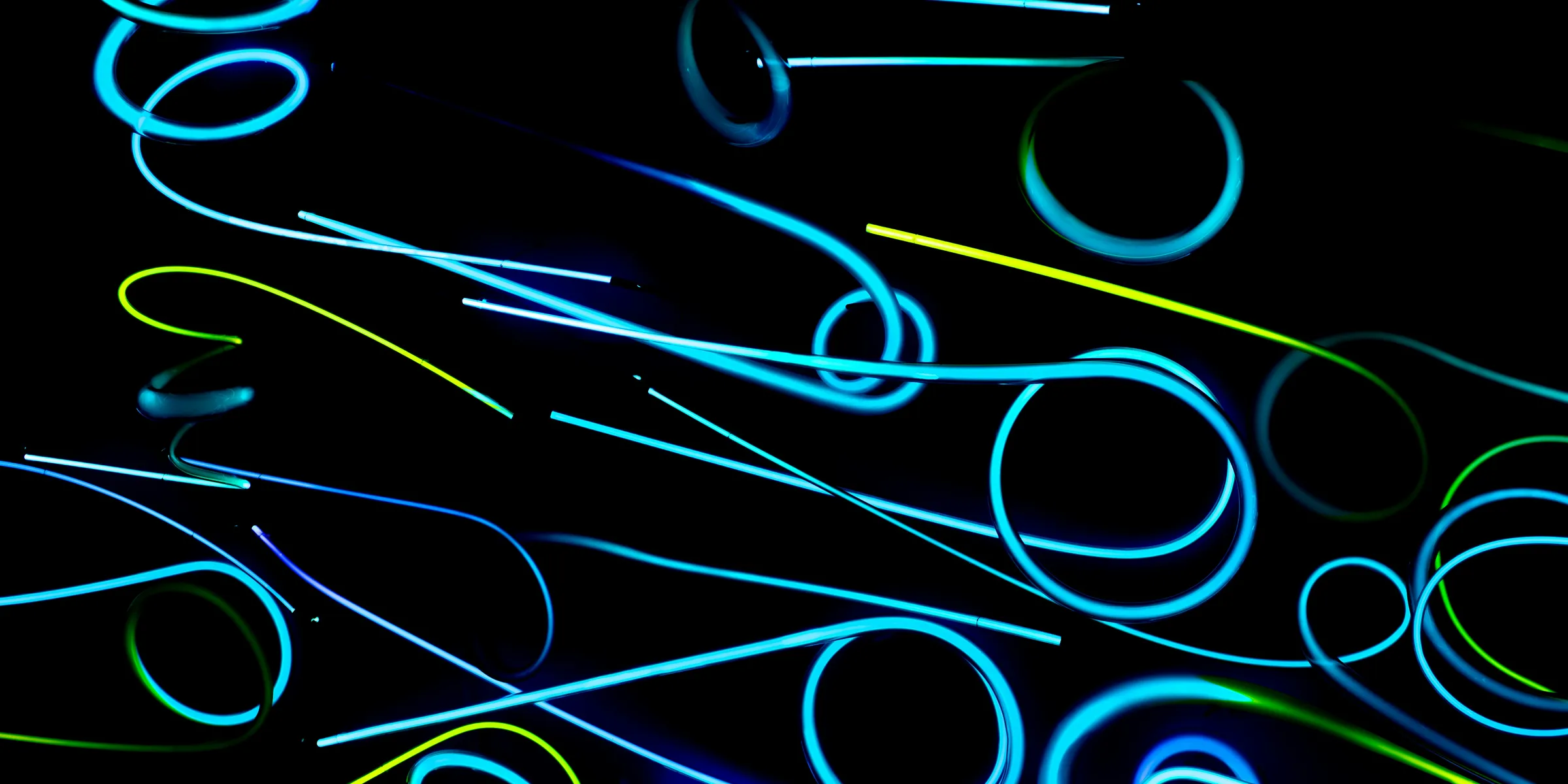 a black background with a bunch of neon lights