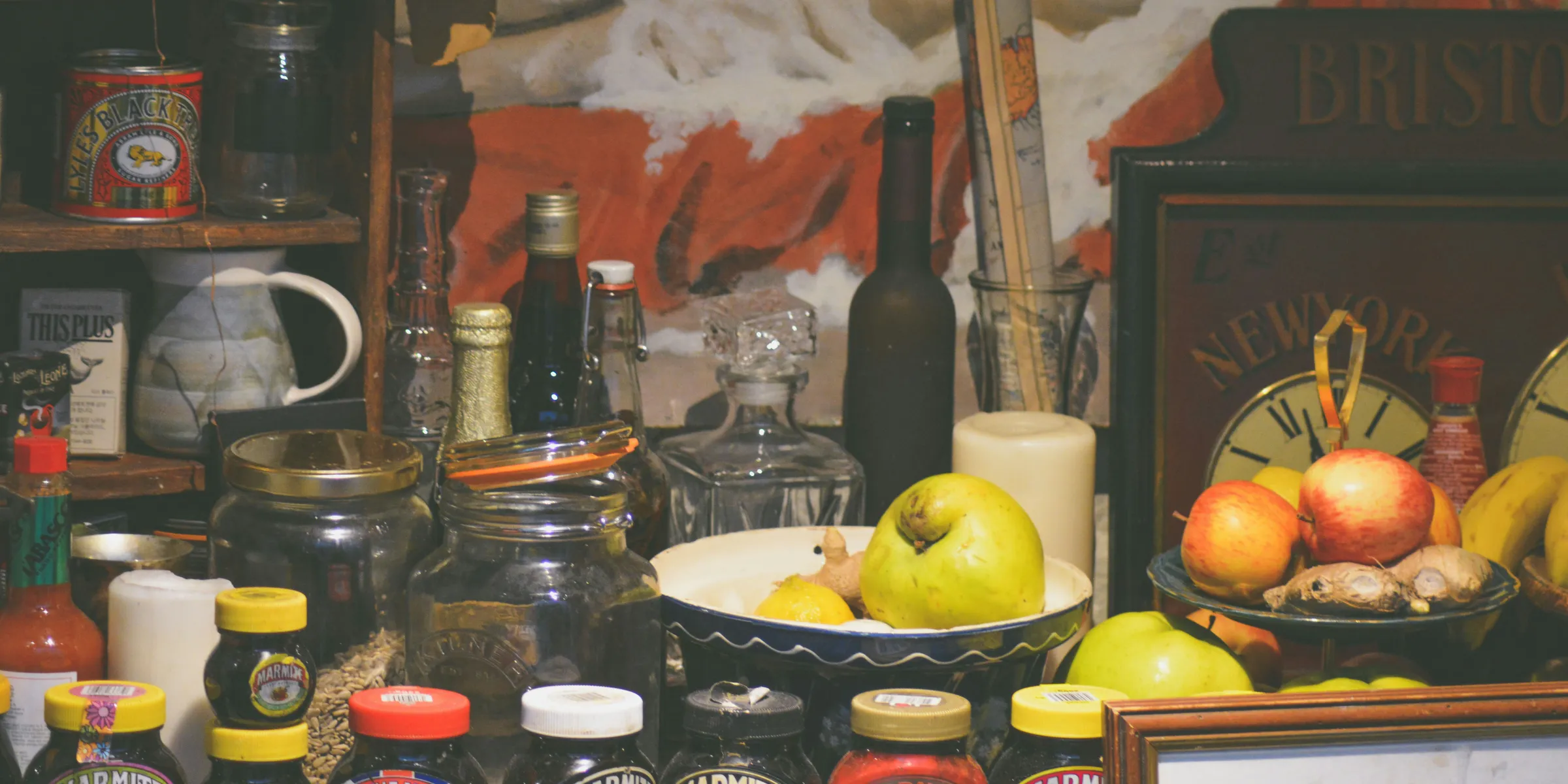 assorted jars and vegetables on table