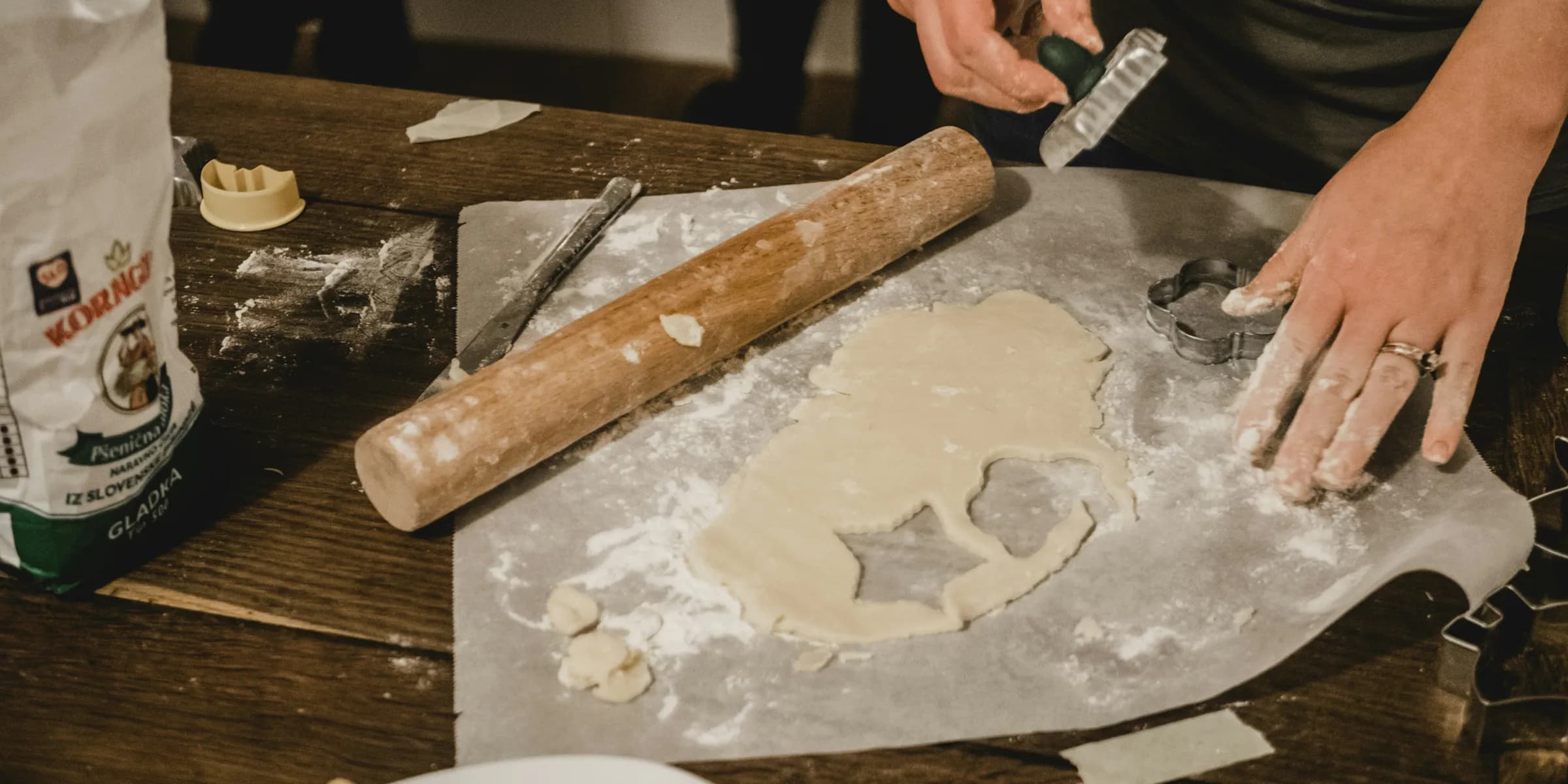 man baked cookies with designs