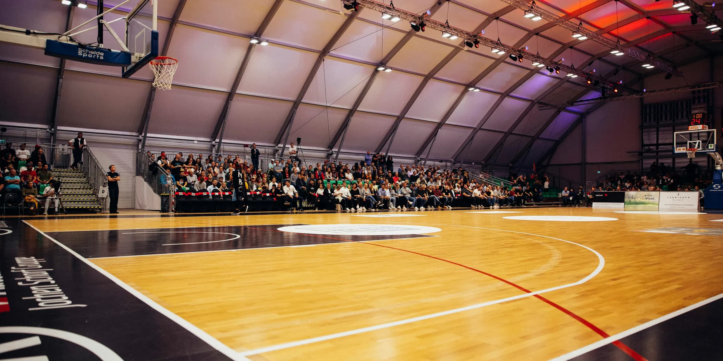 people inside a basketball gym