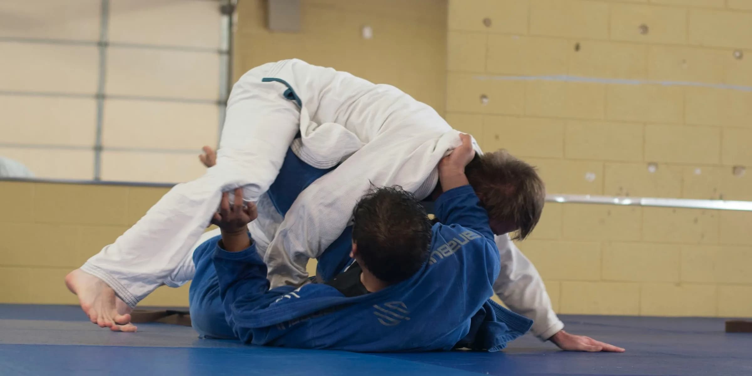 two peope practicing judo