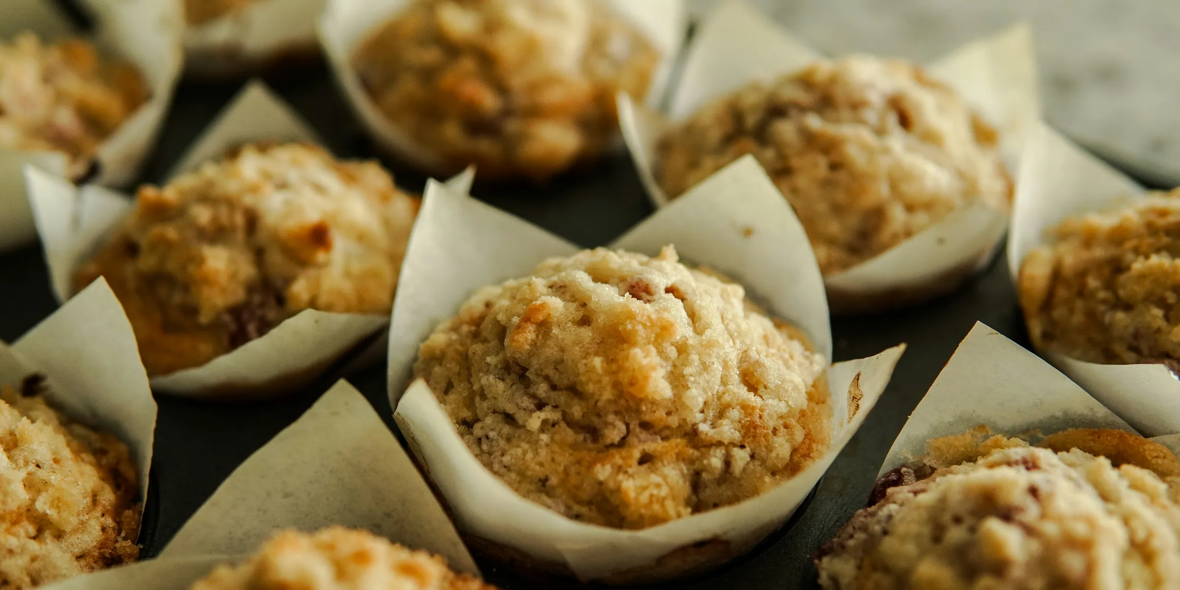 a bunch of muffins sitting on top of a table