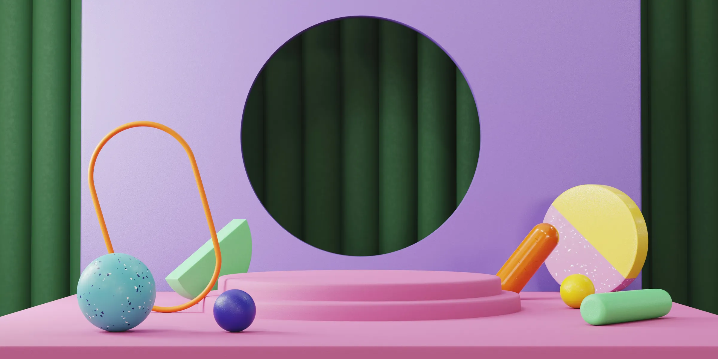 a pink table with some colorful objects on it