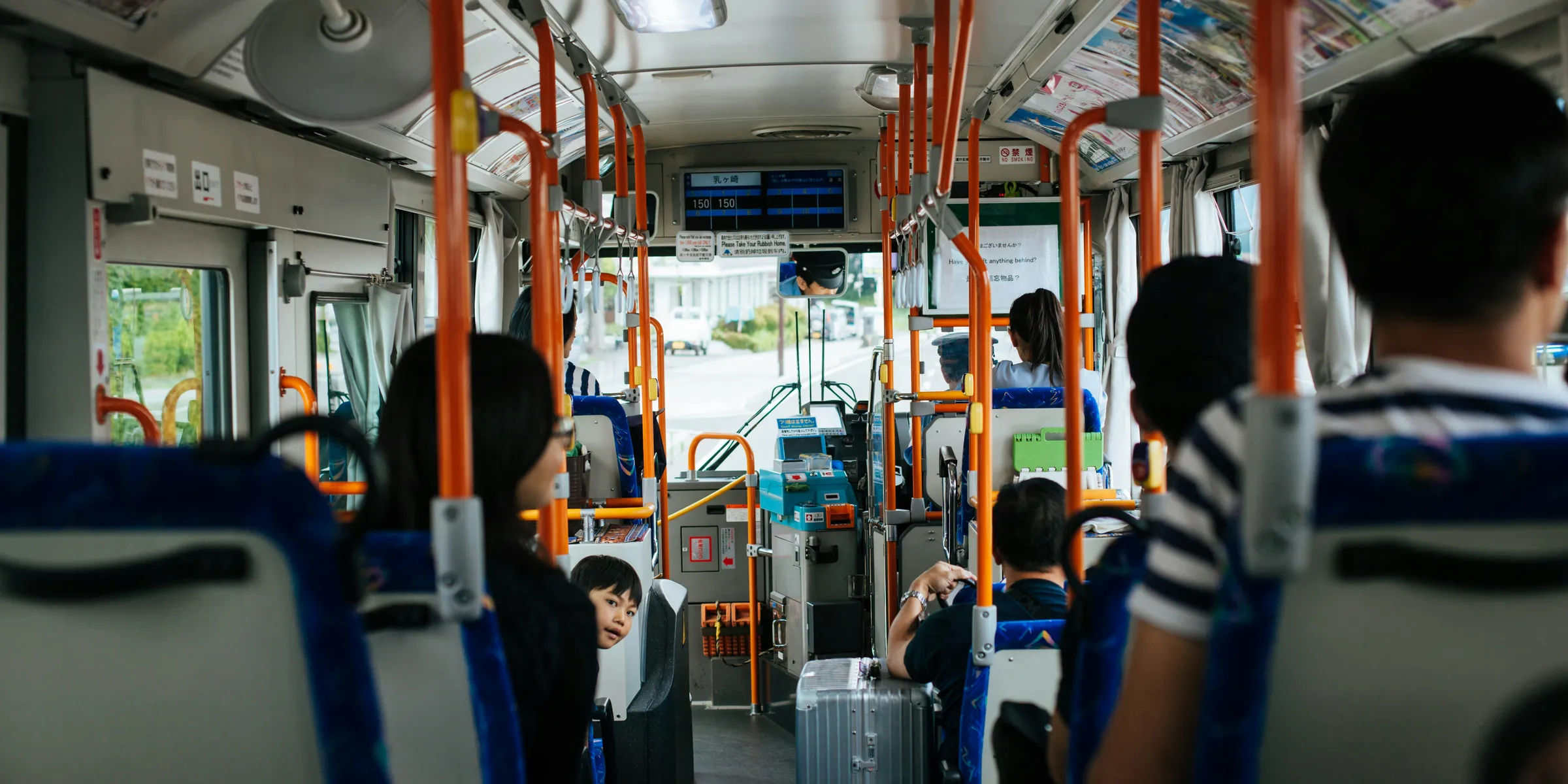 people in train during daytime