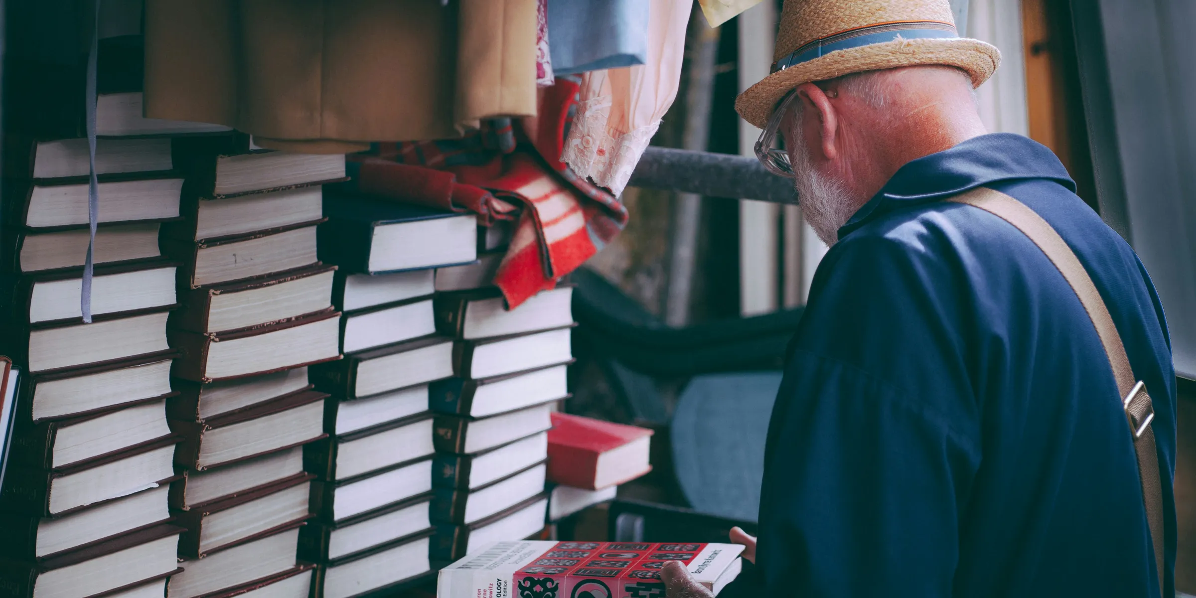 man holding book