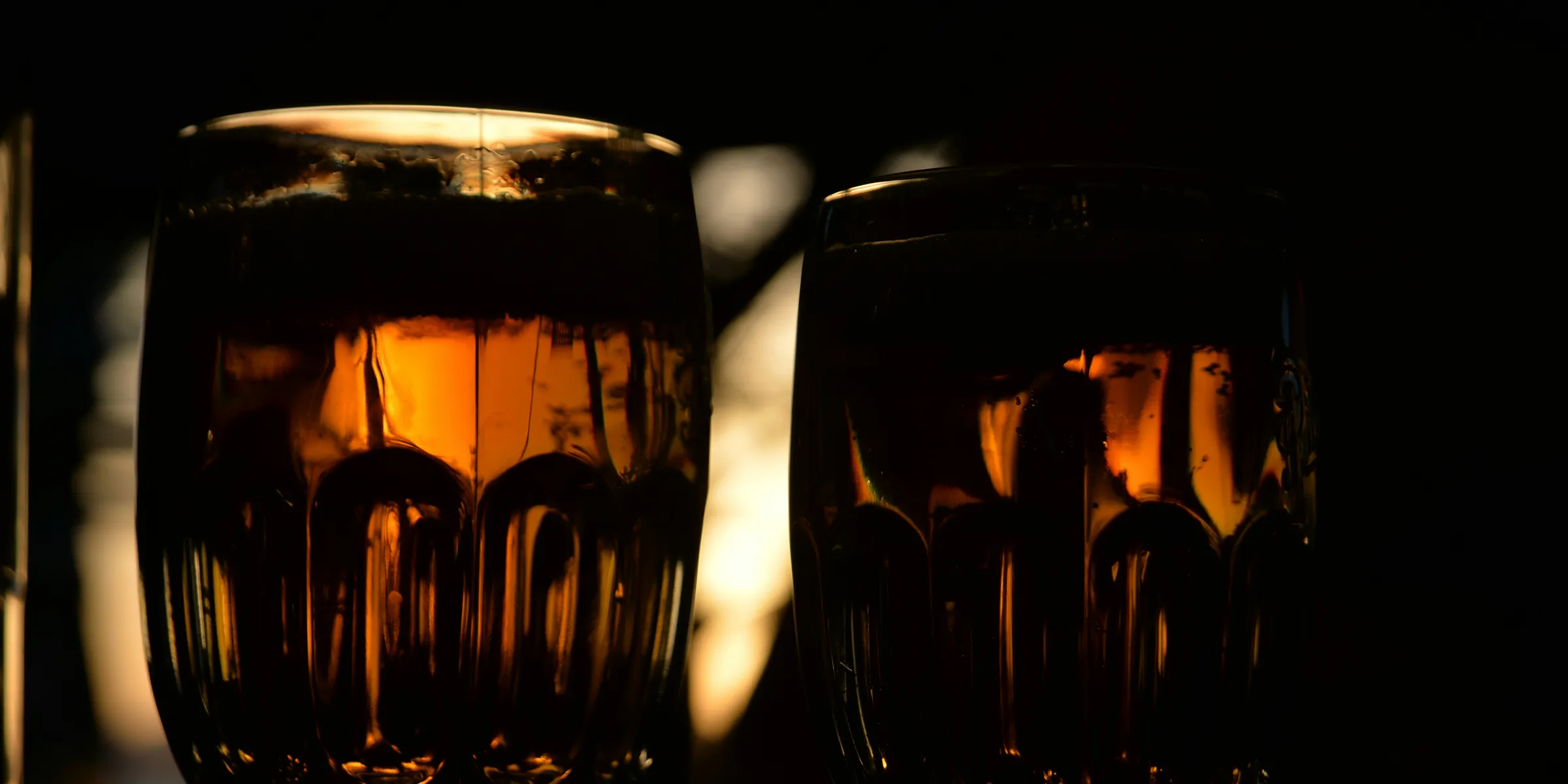 a couple of glasses that are sitting on a table