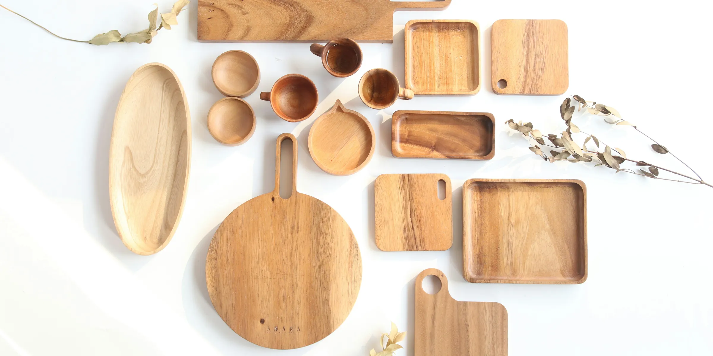 top view of assorted shape and sized wooden kitchen utensils