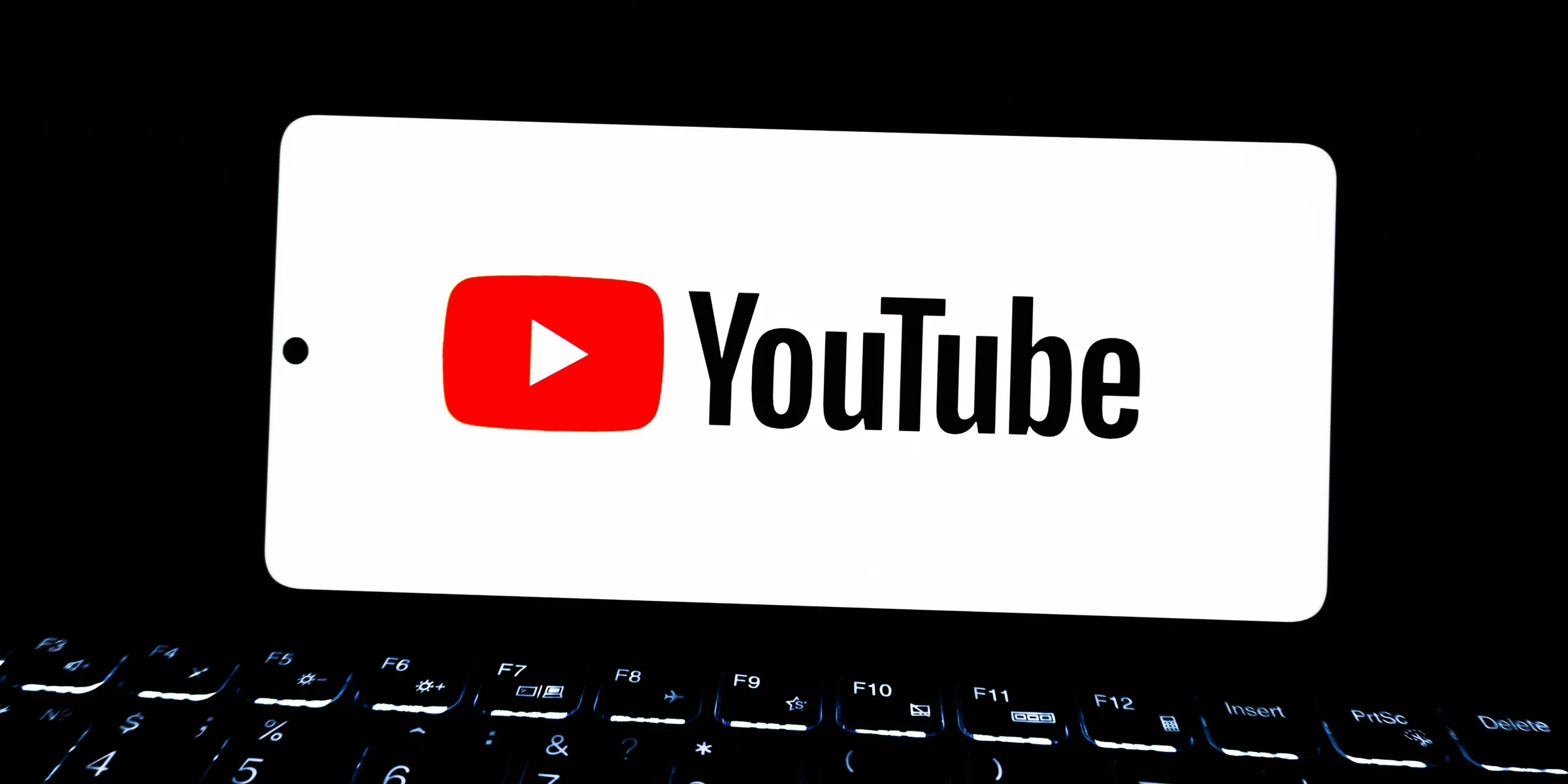 Youtube logo displayed on a smartphone screen.