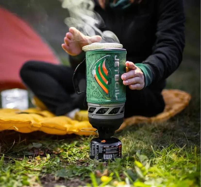 Camping imagery featuring Flash Cooking System