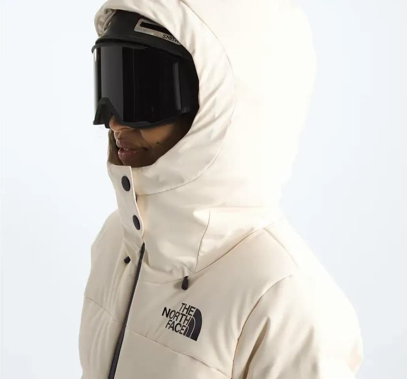 Winter sports imagery featuring Women’s Cirque Down Jacket