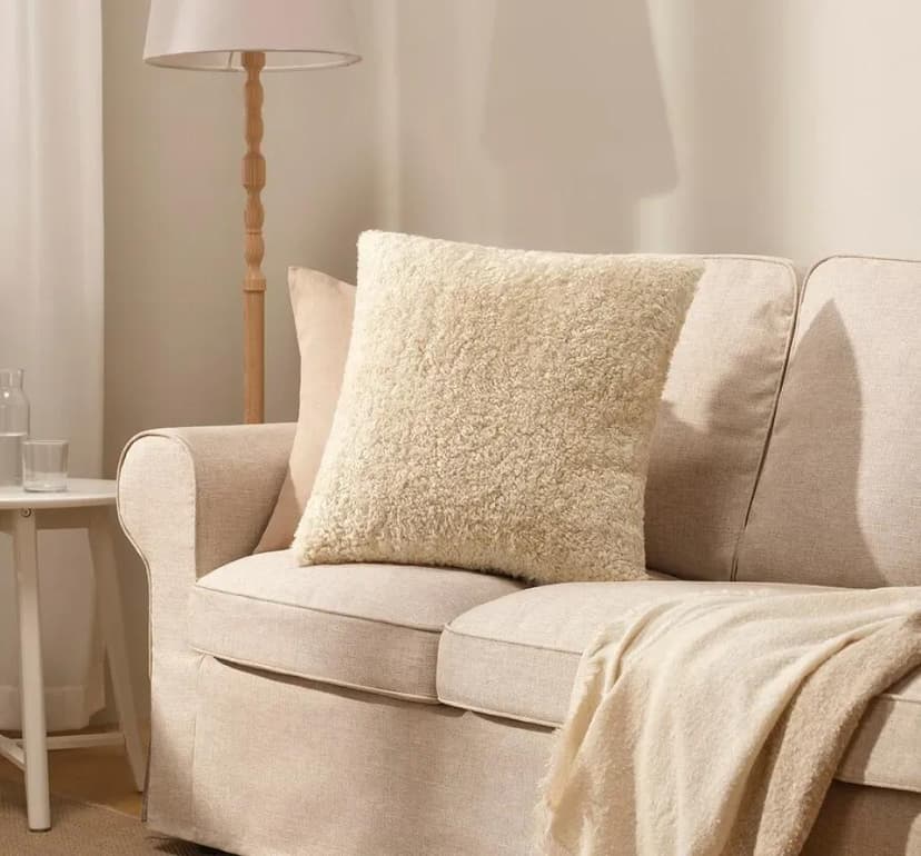 Home essentials imagery featuring ÅSJORDFLY cushion cover